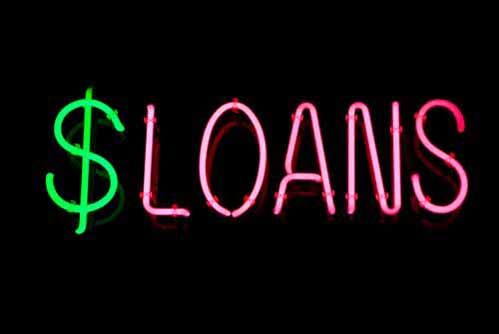 A neon sign that says 'Loans'